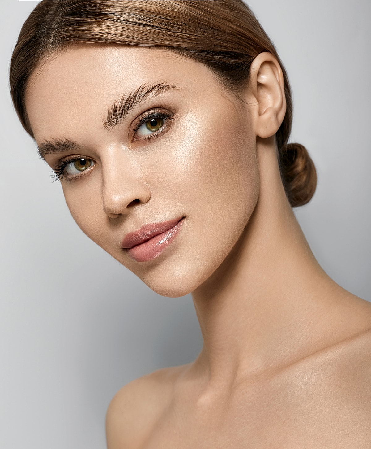 Close-up portrait of a woman with natural beauty.